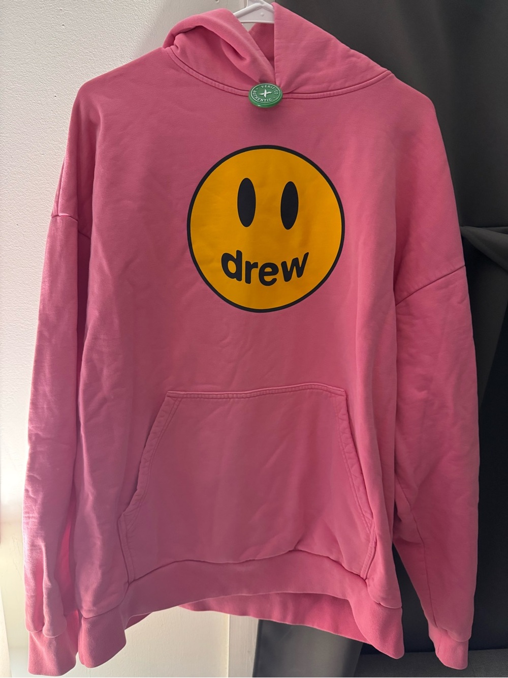 drew house pink hoodie with yellow smiley